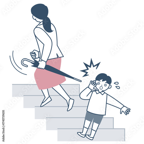 階段で危険な傘の持ち方をしている女性