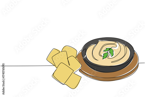 Single continuous line drawing hummus in a black bowl on a round wooden cutting board with pita chips. Traditional Middle Eastern food. International Hummus Day. One line design vector illustration