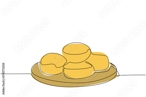 Single continuous line drawing buttermilk biscuits on a round wooden cutting board. A delicious warm meal. Good nutrition for body. National Buttermilk Biscuit Day. One line design vector illustration