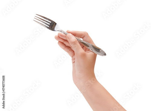 Close up of hand holding a modern silver fork with a small white drop, isolated.