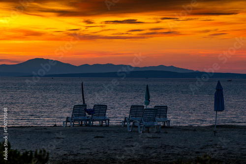 Fototapeta Naklejka Na Ścianę i Meble -  Sunset over the island and city of Rab in the Adriatic sea, Croatia