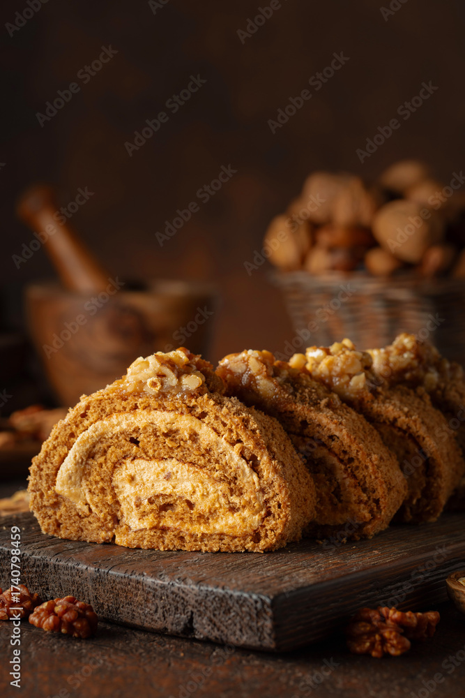 Fototapeta premium Walnut and buttercream roll: a traditional Oriental pastry.