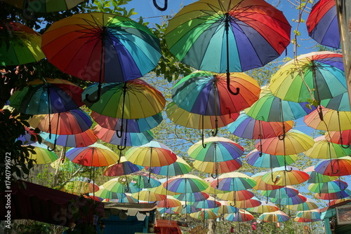 Colorful umbrellas across the street in Istanbul, in the Balat district