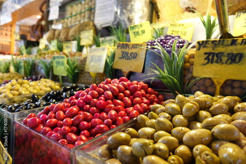 fruits and vegetables at market in Istanbul, close up of red and green olives