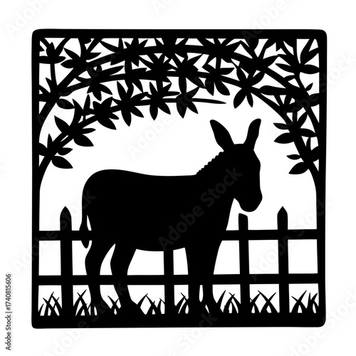Silhouette of donkey behind a fence, framed by tree branches and grass