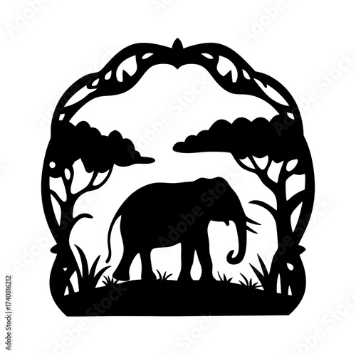 Silhouette of an Elephant Standing Among the Trees in the African Savannah