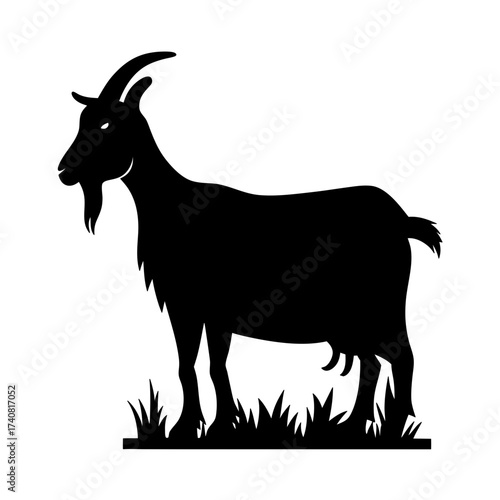 Black silhouette of a goat standing on grass in a simple design