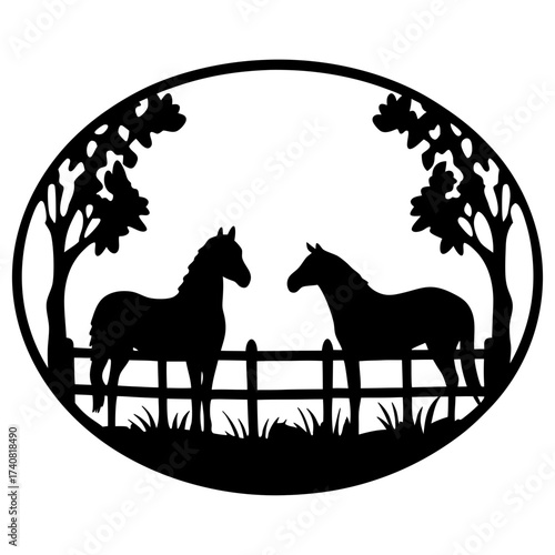 Silhouette of two horses in a pasture with trees and fence within circle