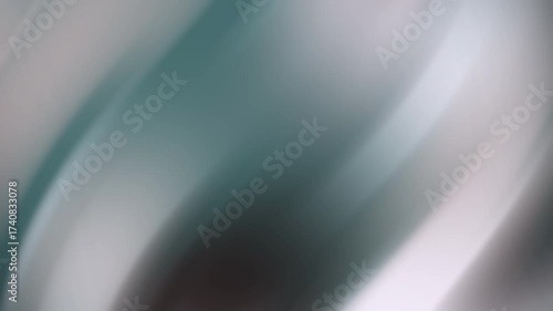 Abstract blurred image in teal gray and white, perfect for backgrounds, website design, social media posts, and digital art projects.