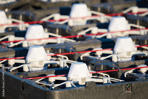 Several drones lined up waiting to participate in the evening drone show