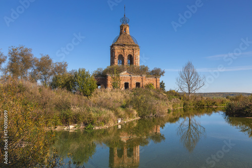 Ruins of Transfiguration Church in Zherdevo, Tula region, reflected in water