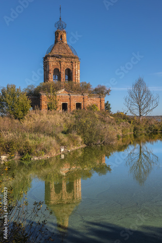 Ruins of Transfiguration Church in Zherdevo, Tula region, reflected in water