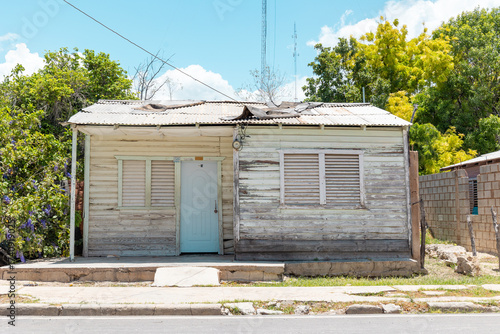 Pedernales, Dominican Republic, 8 august 2025. Typical Dominican Caribbean house made of wood, painted white.