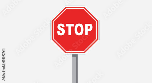 A classic red and white octagonal stop sign on a gray post, centered on a blank white backdrop