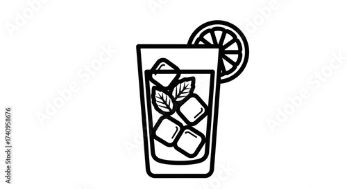 Refreshing summer drink with ice cubes mint and lemon slice.