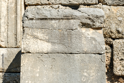 Kemer. Türkiye. July 15th, 2025. A stone block with the remains of an ancient text in the ruins of the city of Phaselis in Lycia, on the territory of modern Turkey.