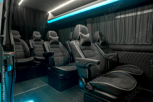 Comfortable interior of a passenger bus with soft seats