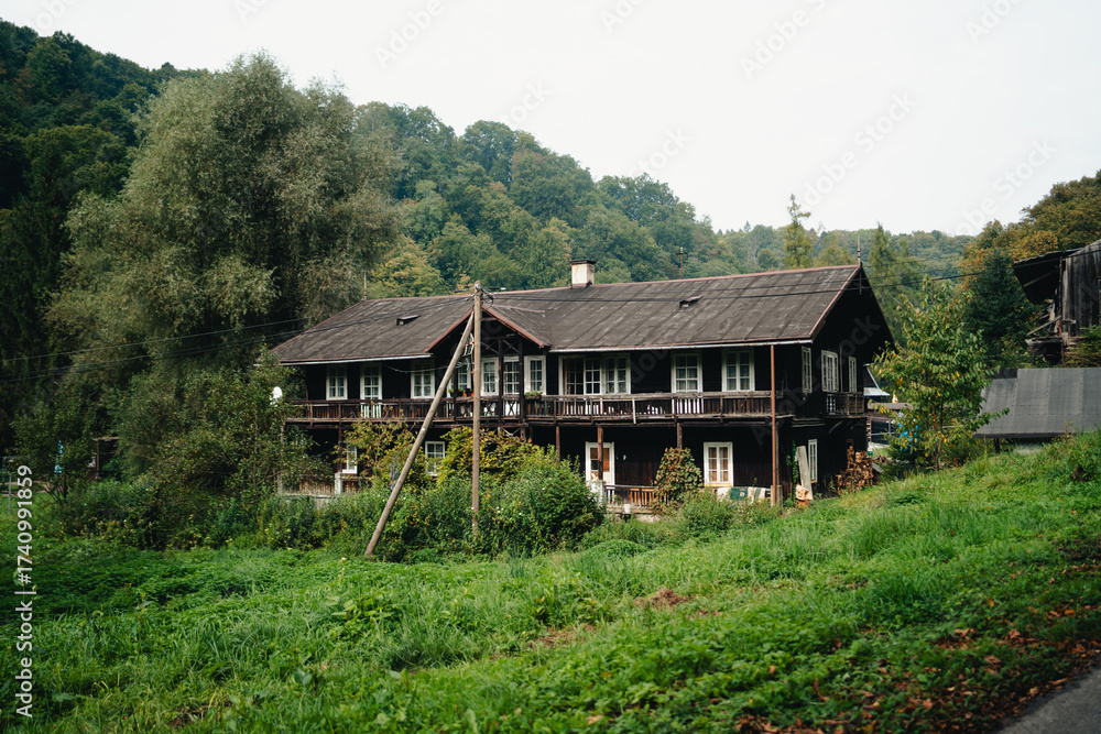 Fototapeta premium Traditional polish wooden buidling, house at Ojcowski National Park. Polish mountains, village, september in Poland