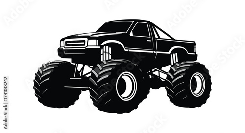 Aggressive black monster truck with oversized tires ready for off-road action and extreme sports excitement