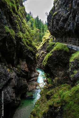 Hiking Girl On Spectacular Trail Triftsteig Through Canyon Tiefenbachklamm With Brandenburger Ache In Tyrol, Austria