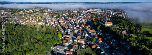 Aerial view around the old town of Marktoberdorf in Germany on a sunny early spring noon
