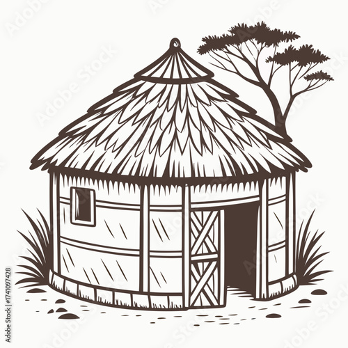 Traditional African hut with thatched roof and acacia tree