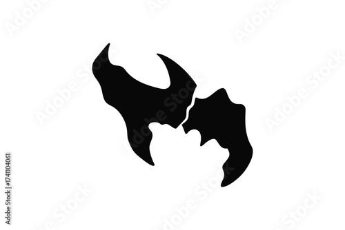 Abstract black silhouette of two jagged claw like shapes facing each other on a white background silhouette