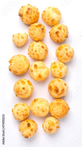 Golden cheese puffs in a vertical arrangement