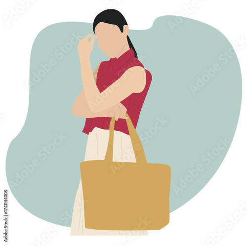 woman carrying a bag in her hand
