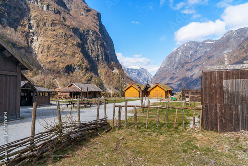 Viking valley village and fjord landscape. Ancient medieval norwegian wooden town, Gudvangen, Aurland, Norway.