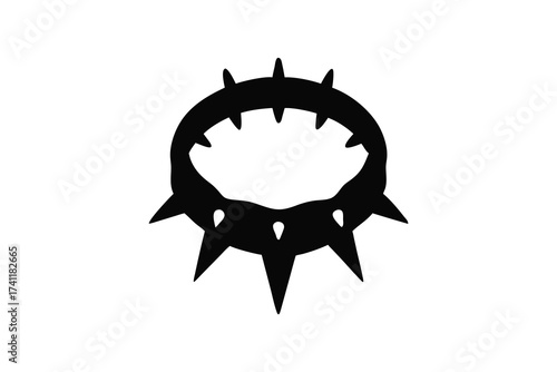 A stark black silhouette of a menacing circular collar with sharp spikes pointing outwards symbolizing danger and aggression presented as a graphic icon silhouette