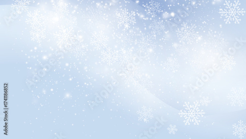 雪の結晶が舞う冬の幻想的な背景素材
