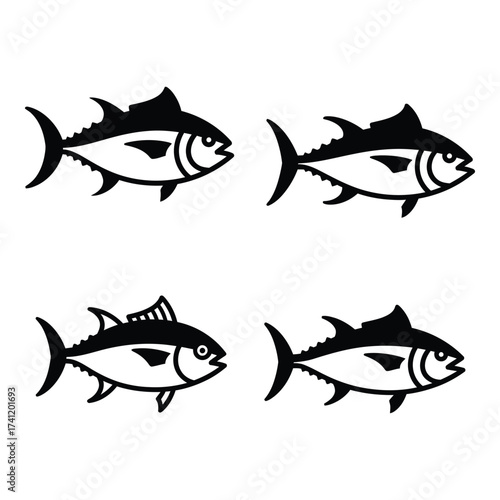 Four stylized tuna fish silhouettes facing different directions for aquatic design projects silhouette