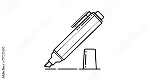 A marker pen lies open with its cap nearby indicating it has been used.