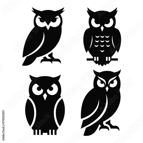 Four black silhouettes of owls in different poses decorative icons for graphic design projects silhouette