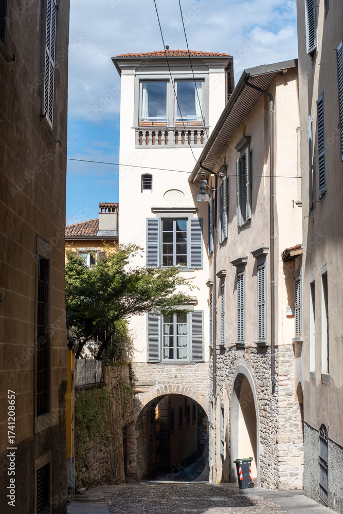 Fototapeta premium Tourists destination, historical part of Bergamo city, Bergamo Alta with narrow streets, churces, old houses, located on hill with fortress walls, Lombardy, Northern Italy