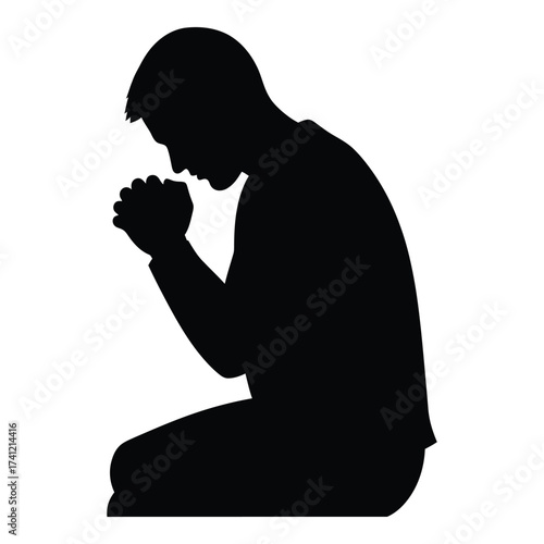 Silhouette of man kneeling in prayer deep in thought and devotion seeking spiritual guidance and peace silhouette