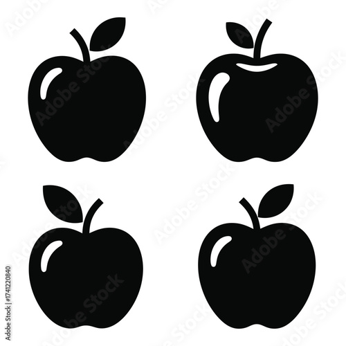 Set of four black apple silhouettes with stems and leaves symbolizing fresh fruit and healthy eating silhouette