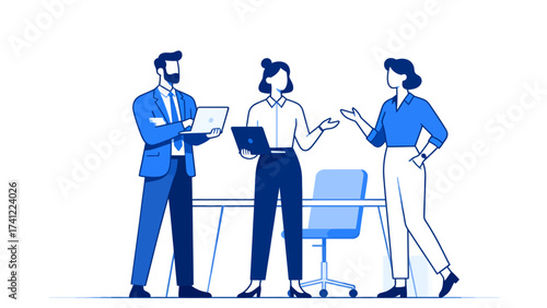 Three people in business attire discussing with laptops