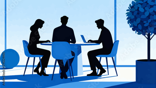 Three people working at a table