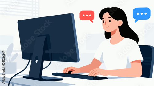 Woman using computer at desk