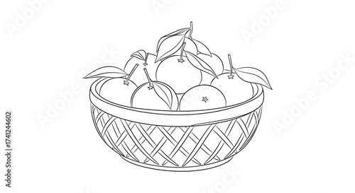 Basket filled with mandarin oranges and leaves 
