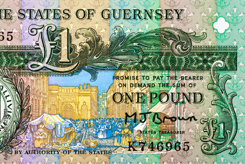 Guernsey 1 Pound 1991 Banknotes. Daniel De Lisle Brock, Channel Island bailiff.Seal of The States of Guernsey; The Market (French Halles).Bonistics.Fragment banknote for design purpose.