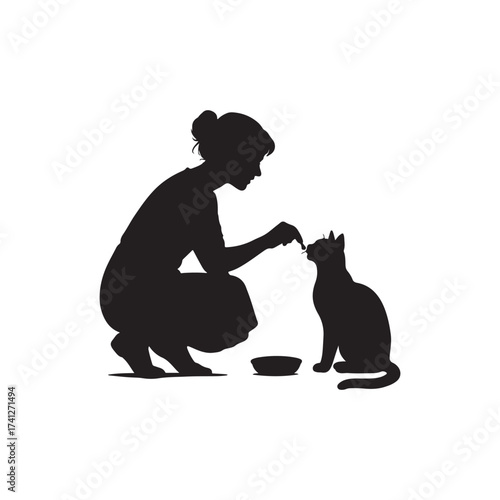 woman feeding a cat