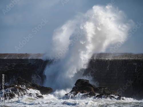 crashing waves over Holyhead breakwater isle of Anglesey