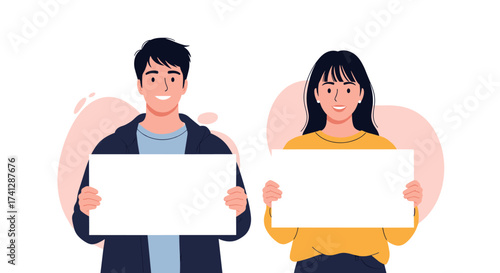 Two young people smiling while holding blank white signs for presentation and advertising purposes.