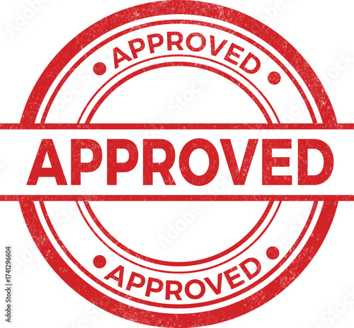 Red circular stamp with the word approved repeated multiple times in a bold font