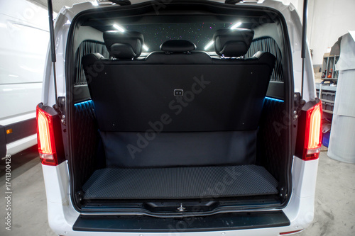 Comfortable interior of a passenger bus with soft seats