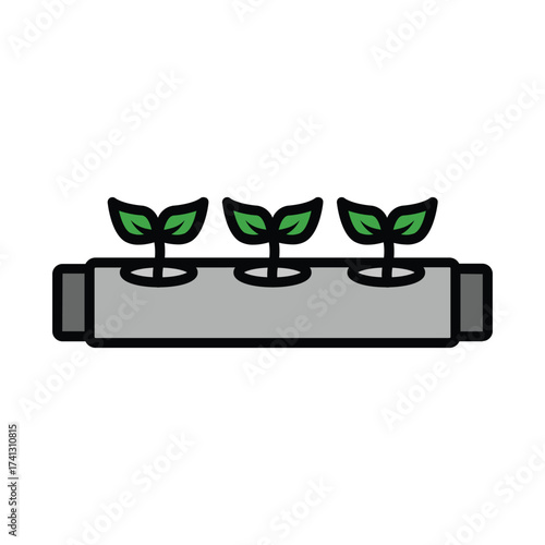 Three small plants sprout from a gray rectangular hydroponic system