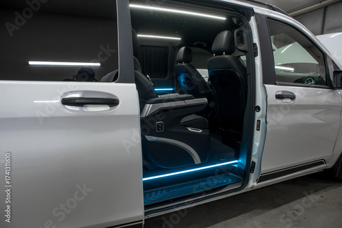 Comfortable interior of a passenger bus with soft seats